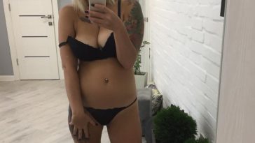 girlfriend in lingerie taking selfie in mirror